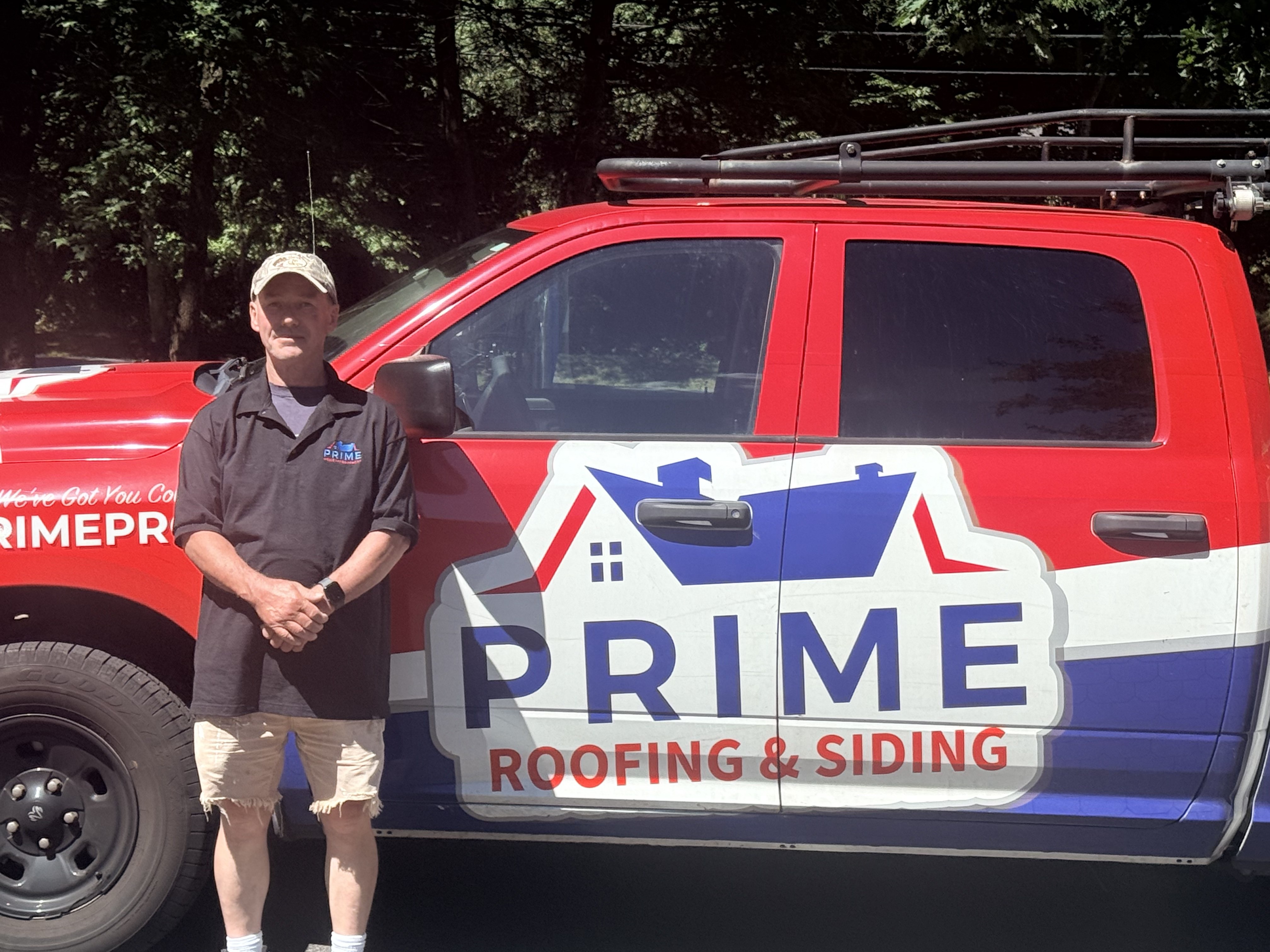 Prime Roofing & Siding branded service van